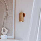 Delran Rattan and Brass Wall Sconce