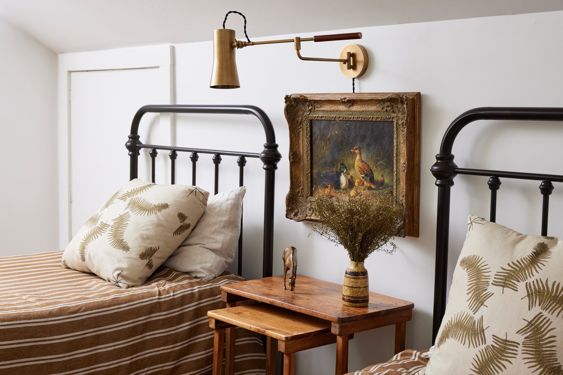 Novelle Plug - In Wall Light in Patina Brass