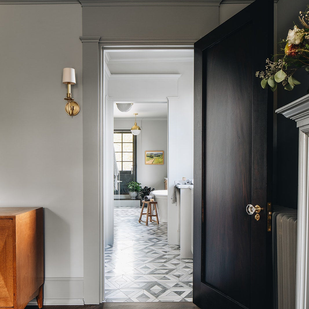 Delmar Single Light Wall Sconce in Aged Brass
