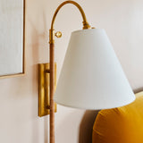 Movement Plug - In Wall Sconce in Aged Brass
