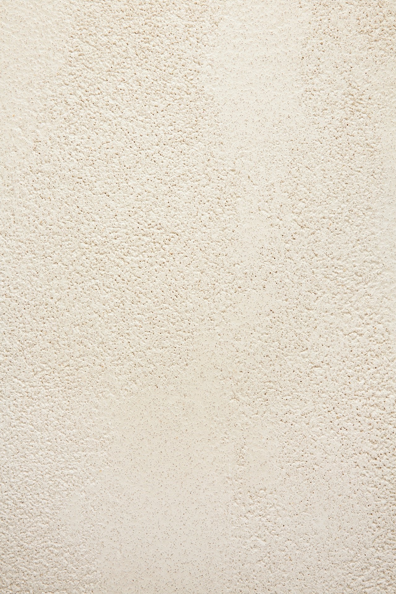 Blend dining table - varnished Microcement top - Off White - Dark Bronze base - round White Cliff Studio Dining Table