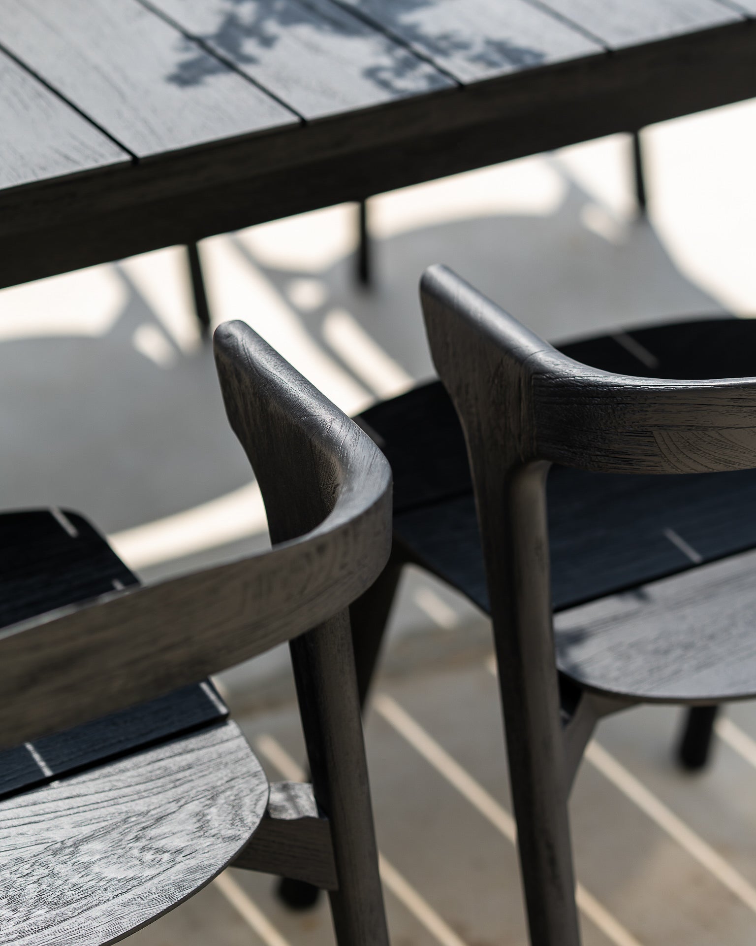 Bok outdoor dining chair - varnished teak - black White Cliff Studio Outdoor Dining Chair