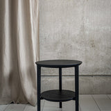 Bok side table - varnished oak - black - round White Cliff Studio Side Table