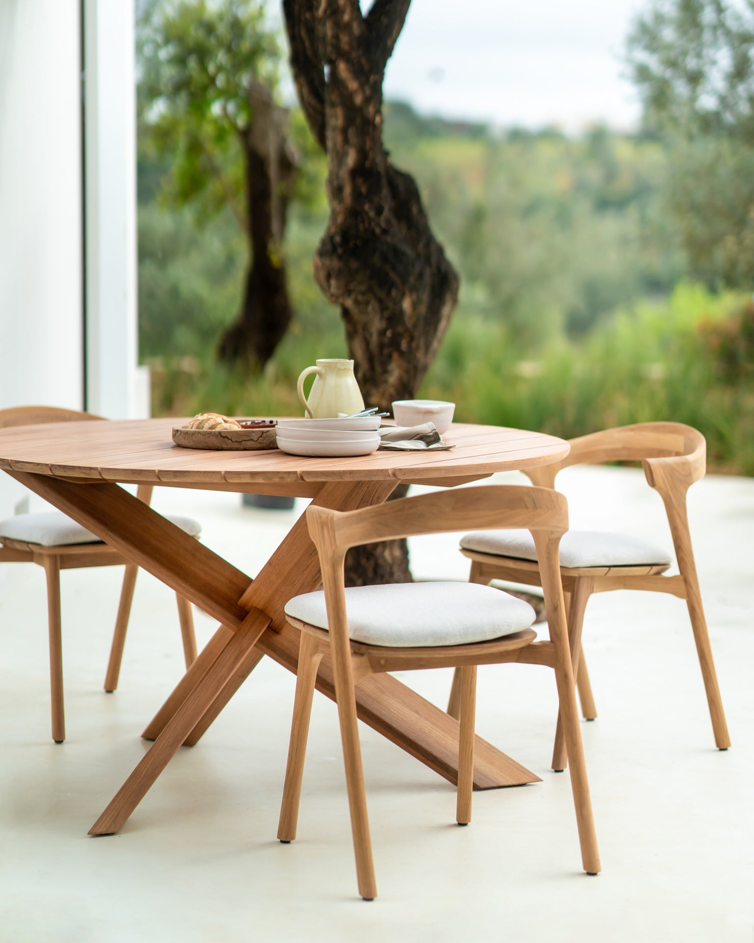 Circle outdoor dining table - teak - round White Cliff Studio Outdoor Dining Table
