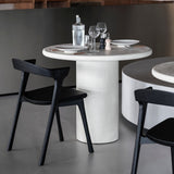 Elements dining table - varnished Microcement - Off White - round White Cliff Studio Dining Table