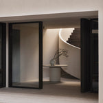 Elements dining table - varnished Microcement - Off White - round White Cliff Studio Dining Table