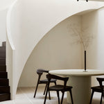 Elements dining table - varnished Microcement - Off White - round White Cliff Studio Dining Table