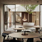 Elements dining table - varnished Microcement - Off White - round White Cliff Studio Dining Table