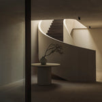 Elements dining table - varnished Microcement - Off White - round White Cliff Studio Dining Table