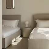 Elements side table - varnished Microcement - Off White - round White Cliff Studio Side Table