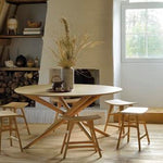 Mikado dining table - varnished oak - black - round White Cliff Studio Dining Table