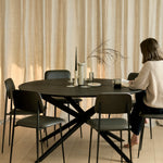 Mikado dining table - varnished oak - black - round White Cliff Studio Dining Table