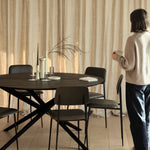 Mikado dining table - varnished oak - black - round White Cliff Studio Dining Table