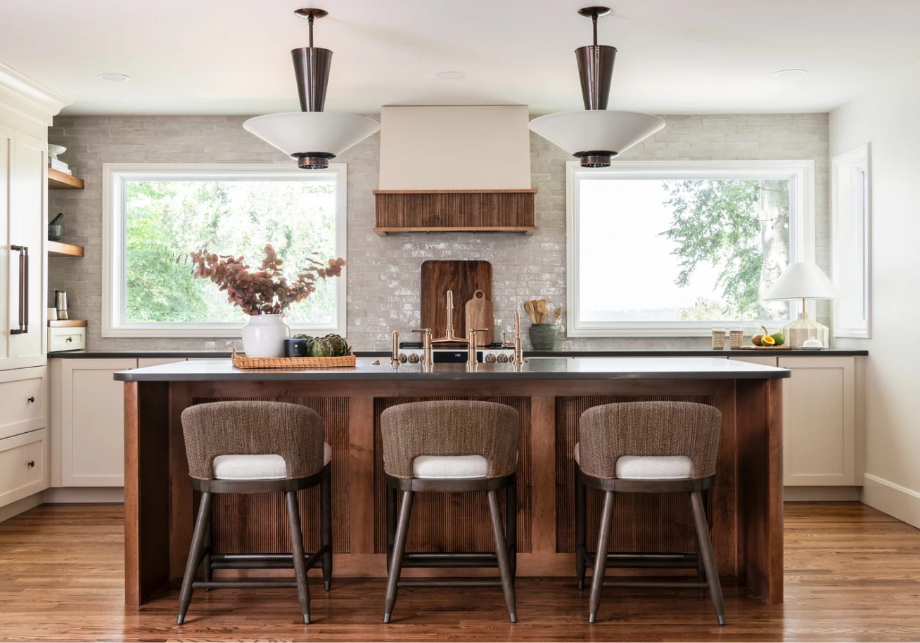 Transitional neutral kitchen with warm woods and dark countertops