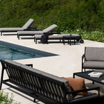 Quatro outdoor coffee table - varnished teak - black - round White Cliff Studio Outdoor Coffee Table