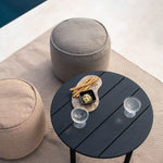 Quatro outdoor coffee table - varnished teak - black - round White Cliff Studio Outdoor Coffee Table