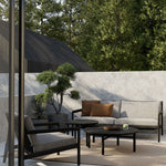 Quatro outdoor coffee table - varnished teak - black - round White Cliff Studio Outdoor Coffee Table