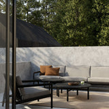 Quatro outdoor coffee table - varnished teak - black - round White Cliff Studio Outdoor Coffee Table