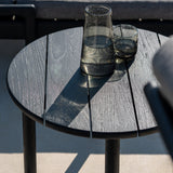 Quatro outdoor side table - varnished teak - black - round White Cliff Studio Outdoor Side Table