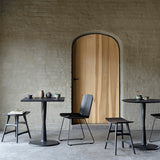 Torsion dining table - varnished oak - black - round White Cliff Studio Dining Table