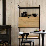 Torsion dining table - varnished oak - black - round White Cliff Studio Dining Table