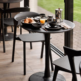 Torsion dining table - varnished oak - black - round White Cliff Studio Dining Table