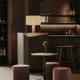 Torsion dining table - varnished oak - black - round White Cliff Studio Dining Table