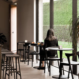 Torsion dining table - varnished oak - black - round White Cliff Studio Dining Table