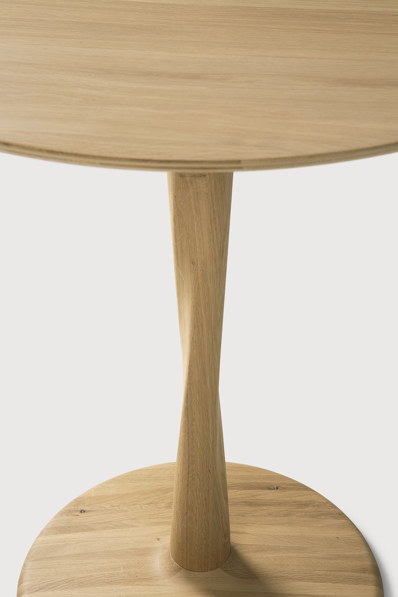 Torsion dining table - varnished oak - round White Cliff Studio Dining Table