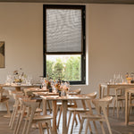 Torsion dining table - varnished oak - round White Cliff Studio Dining Table