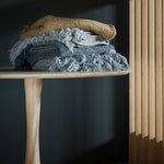 Torsion dining table - varnished oak - round White Cliff Studio Dining Table